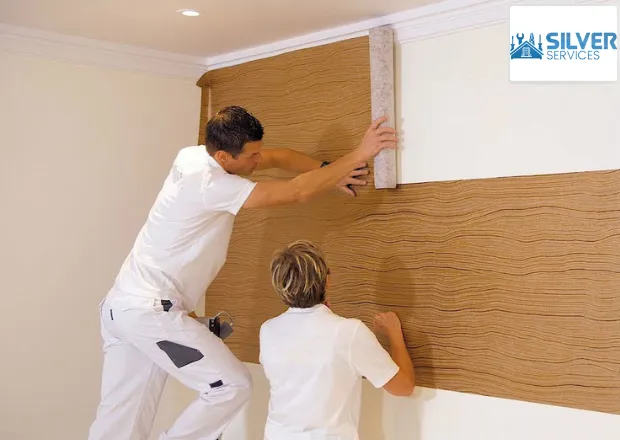 fixing-wallpaper-silver-services-ae fixing wallpaper on wall